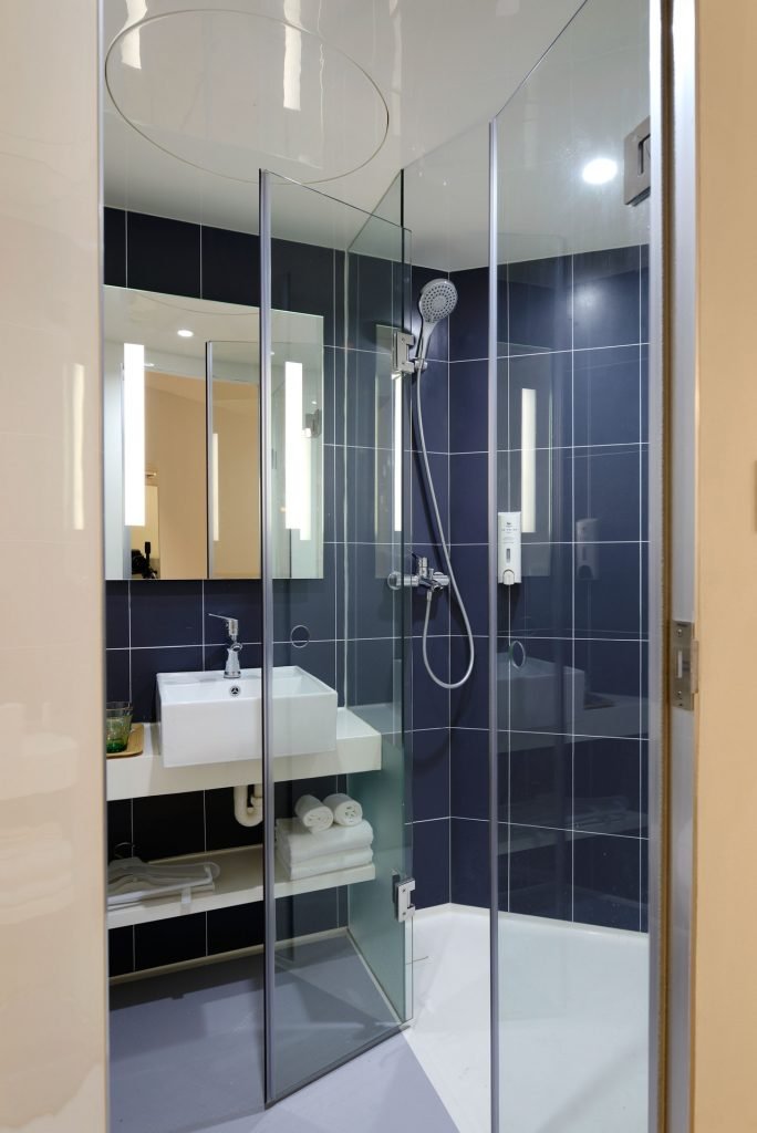 a bathroom with a shower unit