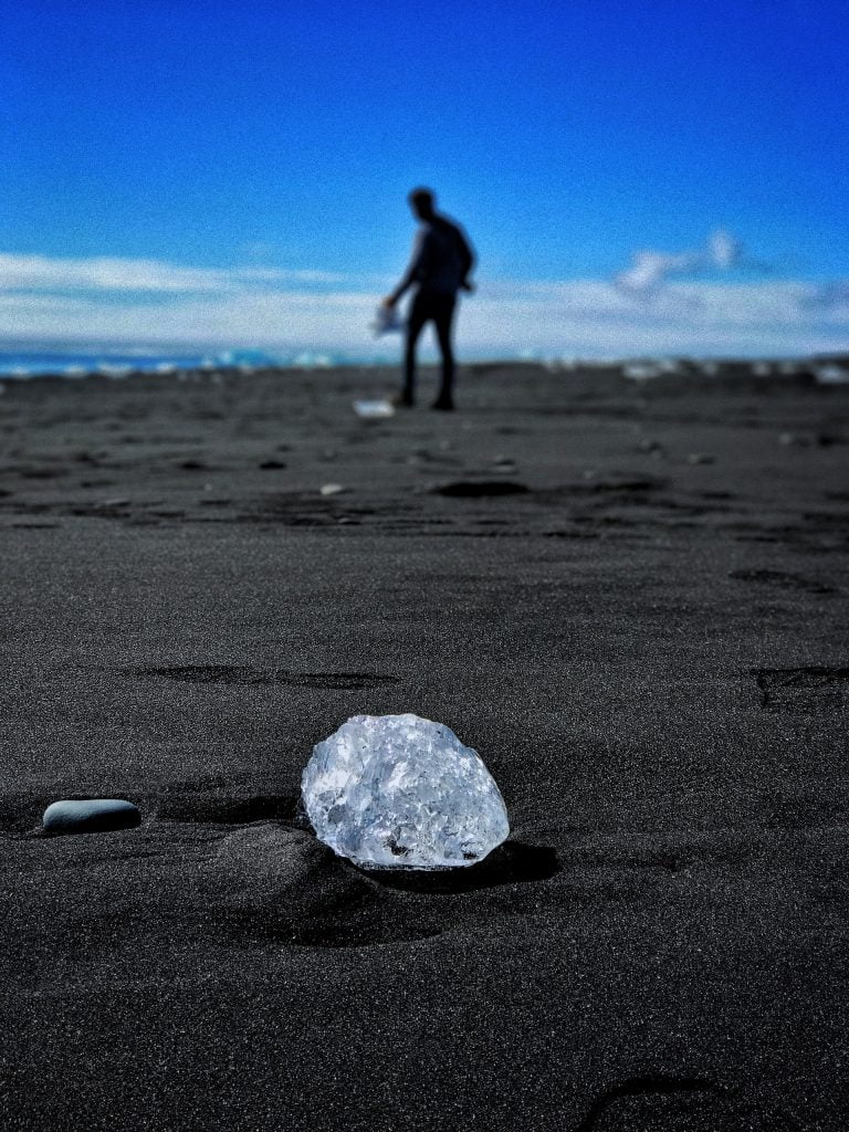 a person standing on a beach