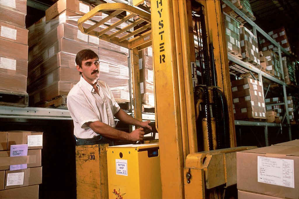 a person standing in a warehouse