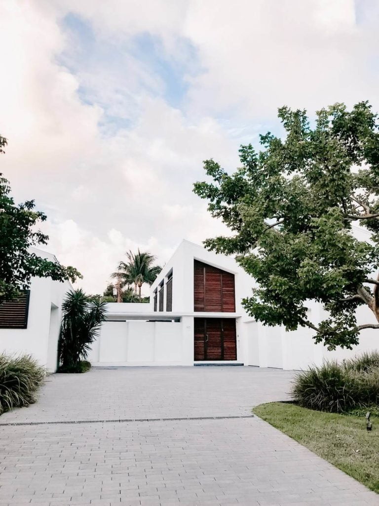 a white house with a red door