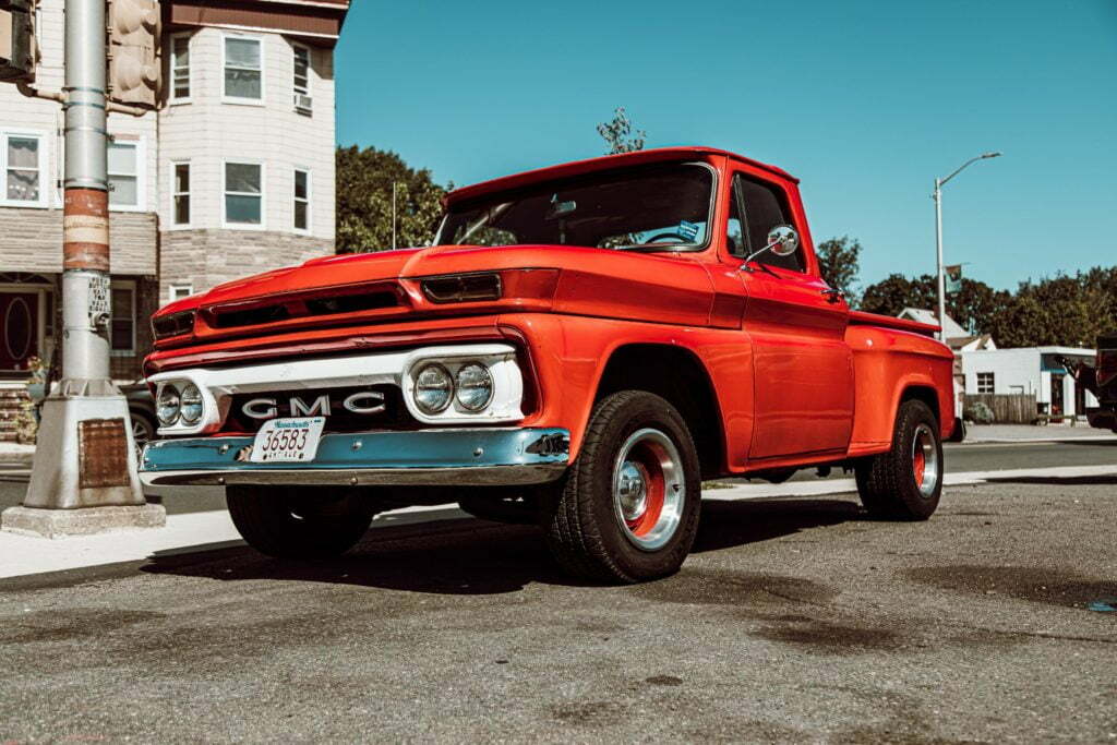 a red car parked on the side of the road