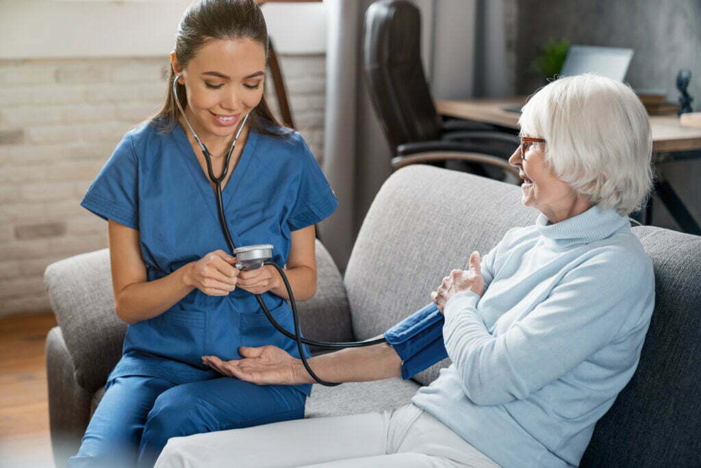 female nurse checking blood pressure of senior wom 2022 05 31 02 21 30 utc