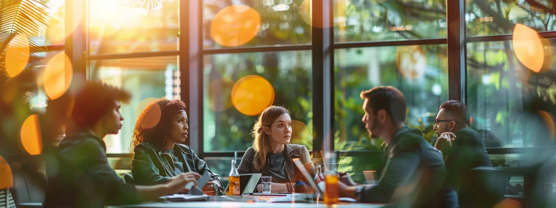 How Taking Online Courses Transforms Business Skills 1 a group of professionals engaged in online business courses, focused and learning.